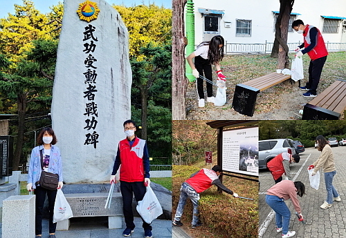 현충시설 환경정화 봉사 모습...BNK경남은행 제공